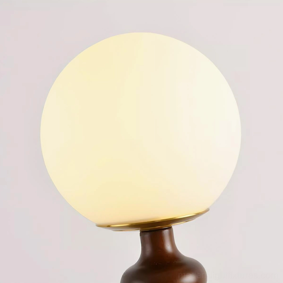 Gleason globe table lamp detail shot emphasizing frosted glass quality and lighting diffusion