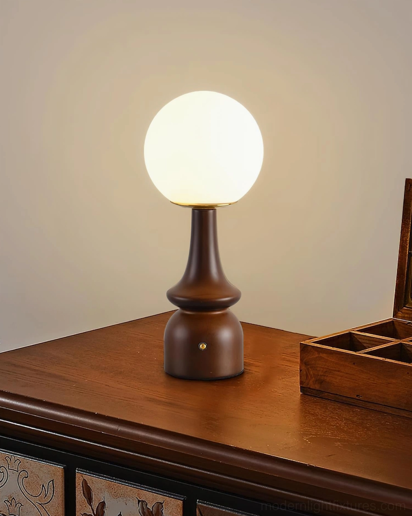 Gleason globe lamp with frosted glass shade and solid wood base in modern home setting