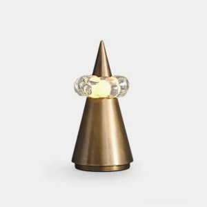 Glint sculptural crystal crown table lamp with brushed bronze metal cone and hand-formed crystal light ring on white studio background