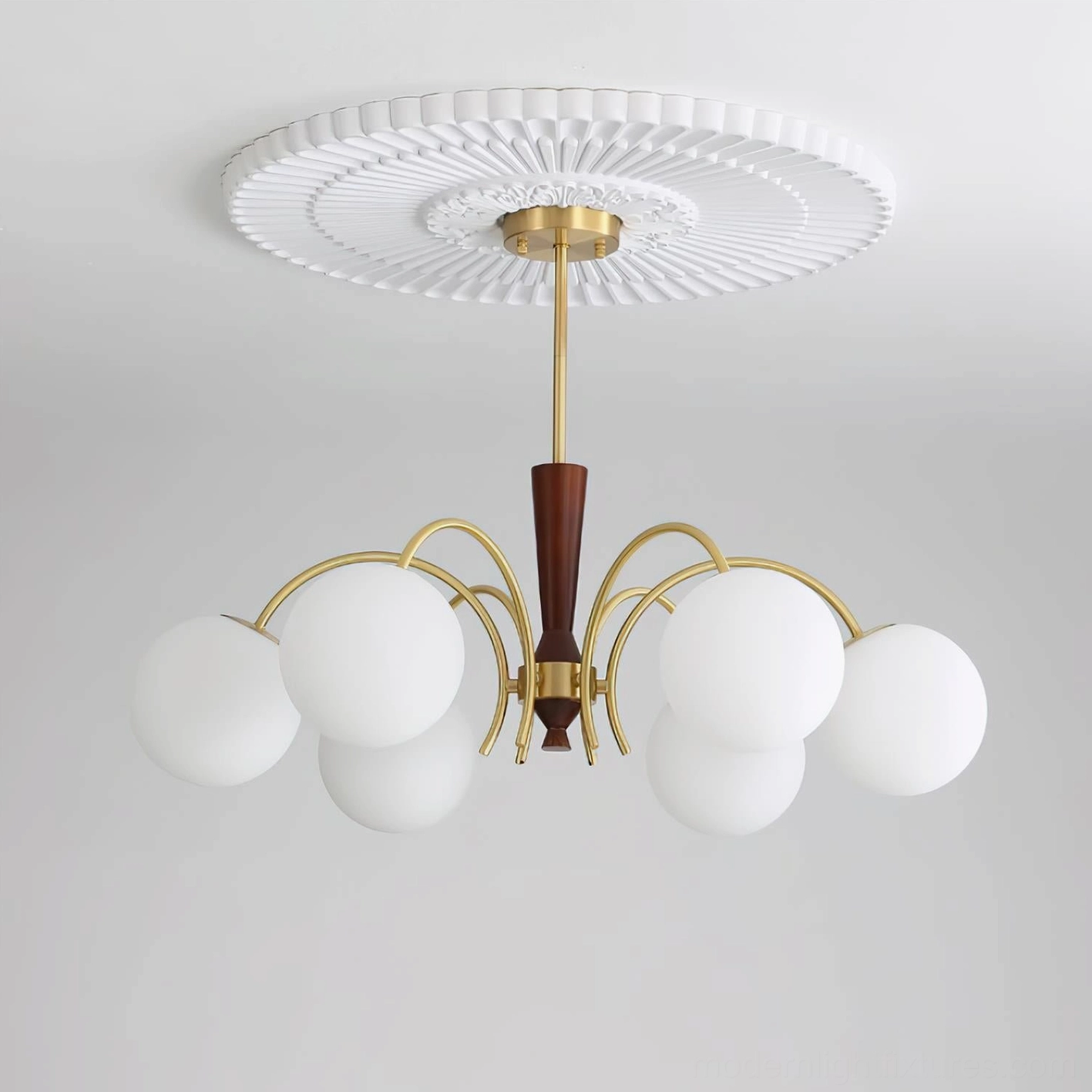 Close-up detail of globe chandelier frosted glass shade with brass connector and adjustable positioning mechanism
