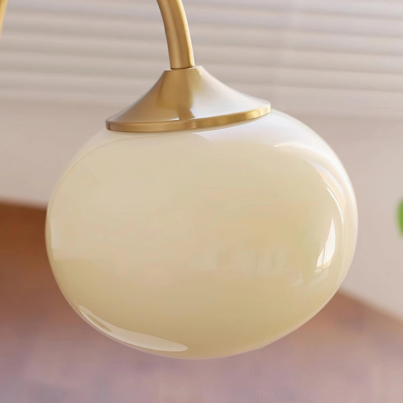 Globe table lamp with clear glass shade and sleek gold metal frame minimalist design