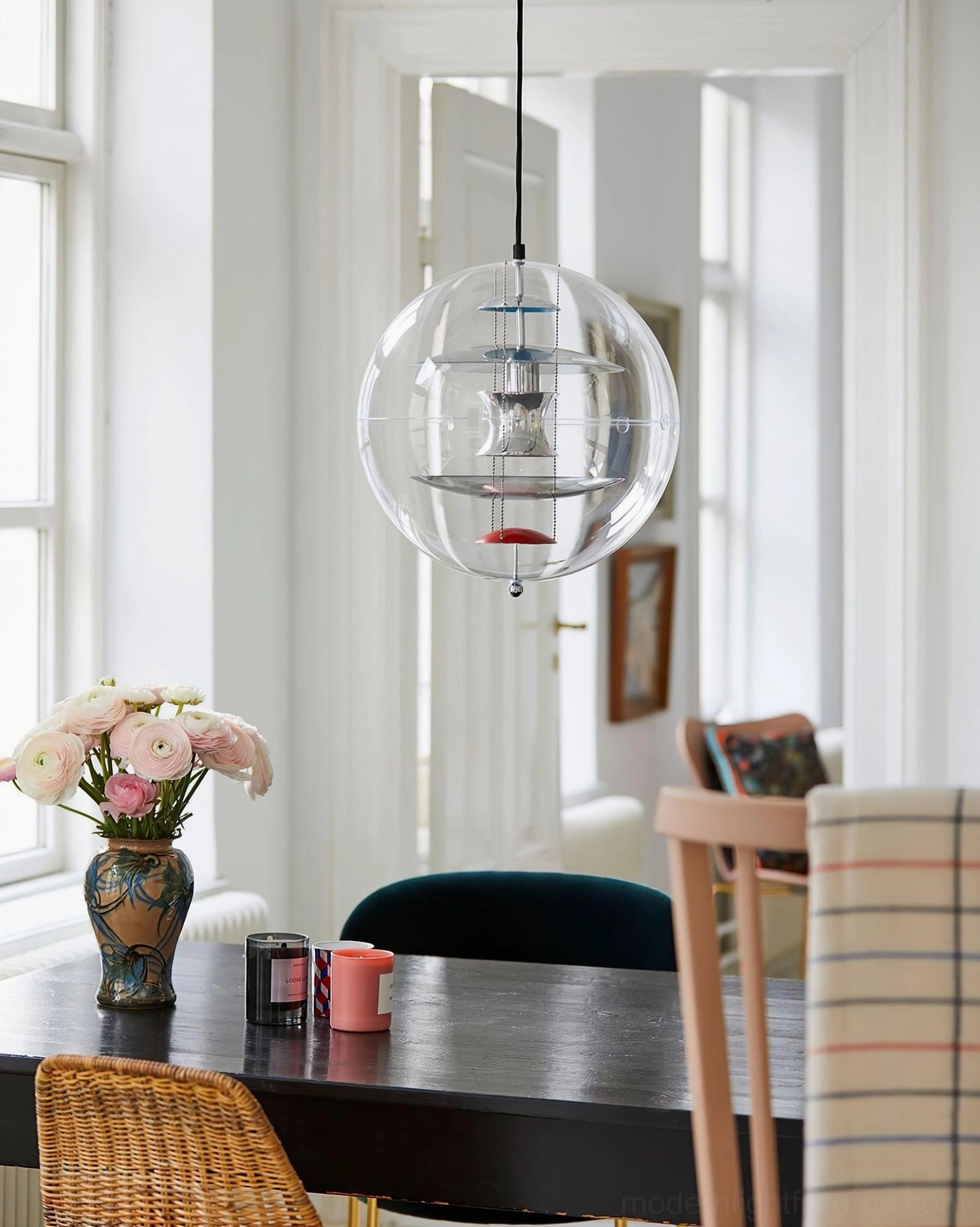 Spherical pendant fixture with precision aluminum reflectors and contemporary design aesthetic