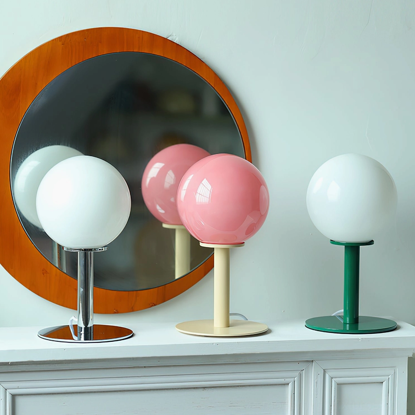 Colorful globe table lamp collection with chrome green beige metal bases and white pink glass shades