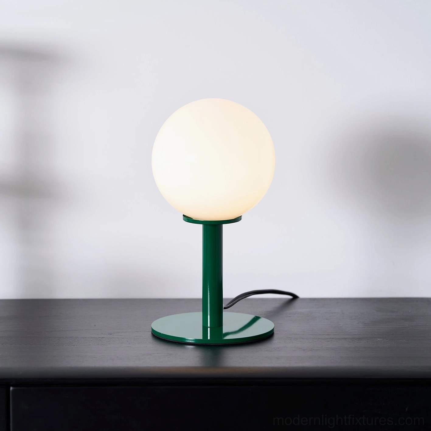 Statement globe table lamp spherical design adds personality and charm to contemporary interiors