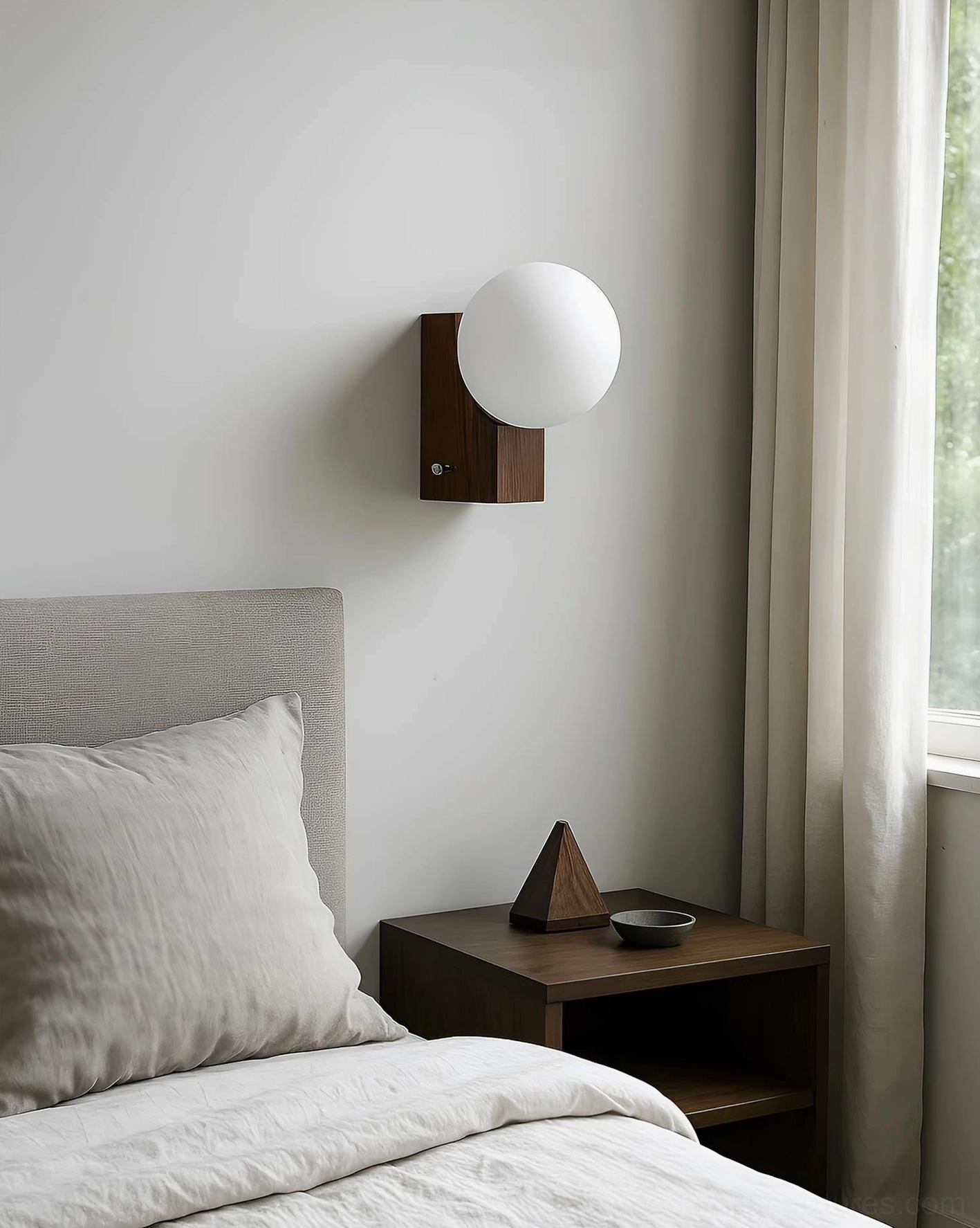 Glowen globe wall sconce in modern bedroom with Nordic minimalist decor, side profile showing architectural integration