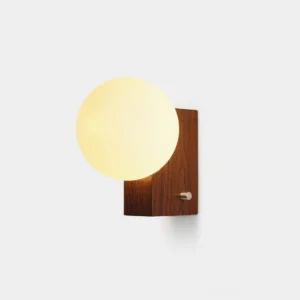 Glowen globe wall sconce with walnut wooden base and frosted white glass shade, Japandi minimalist style front view