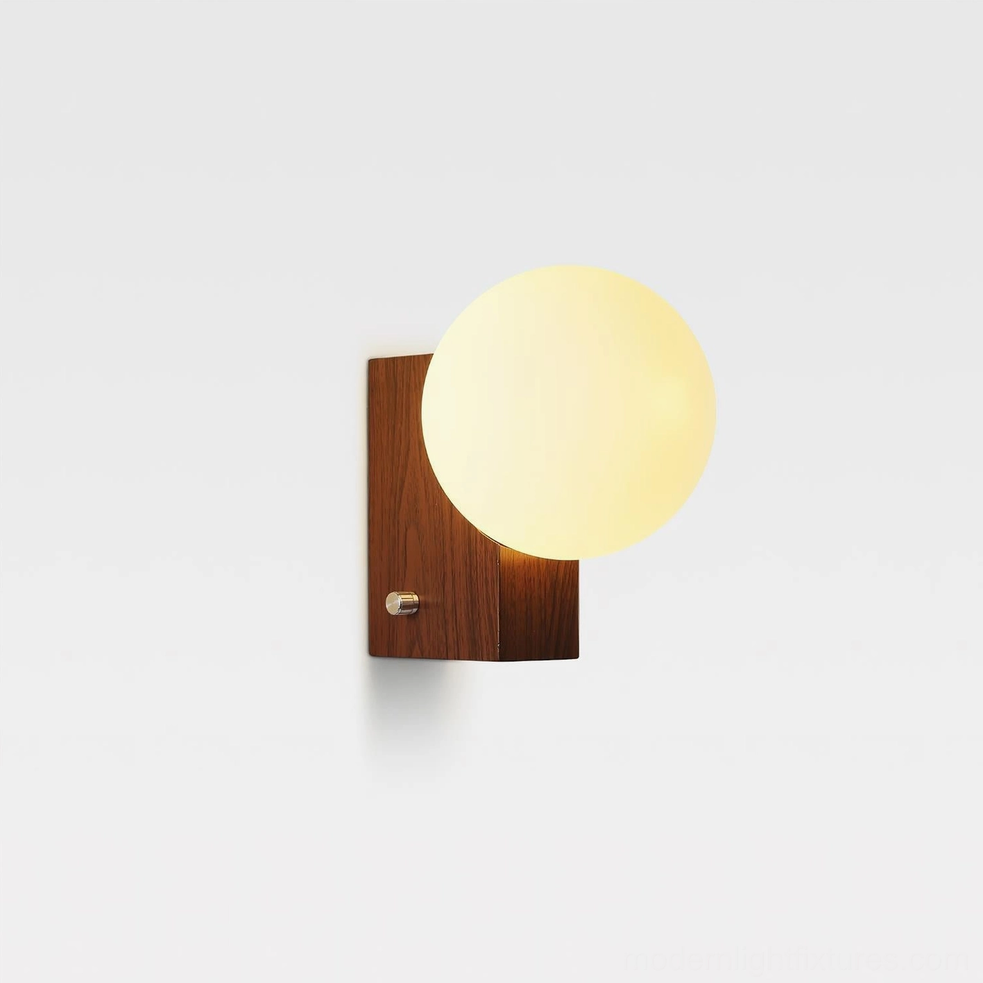 Glowen globe wall lamp with walnut wooden base and bright frosted shade, Japandi minimalist studio front view