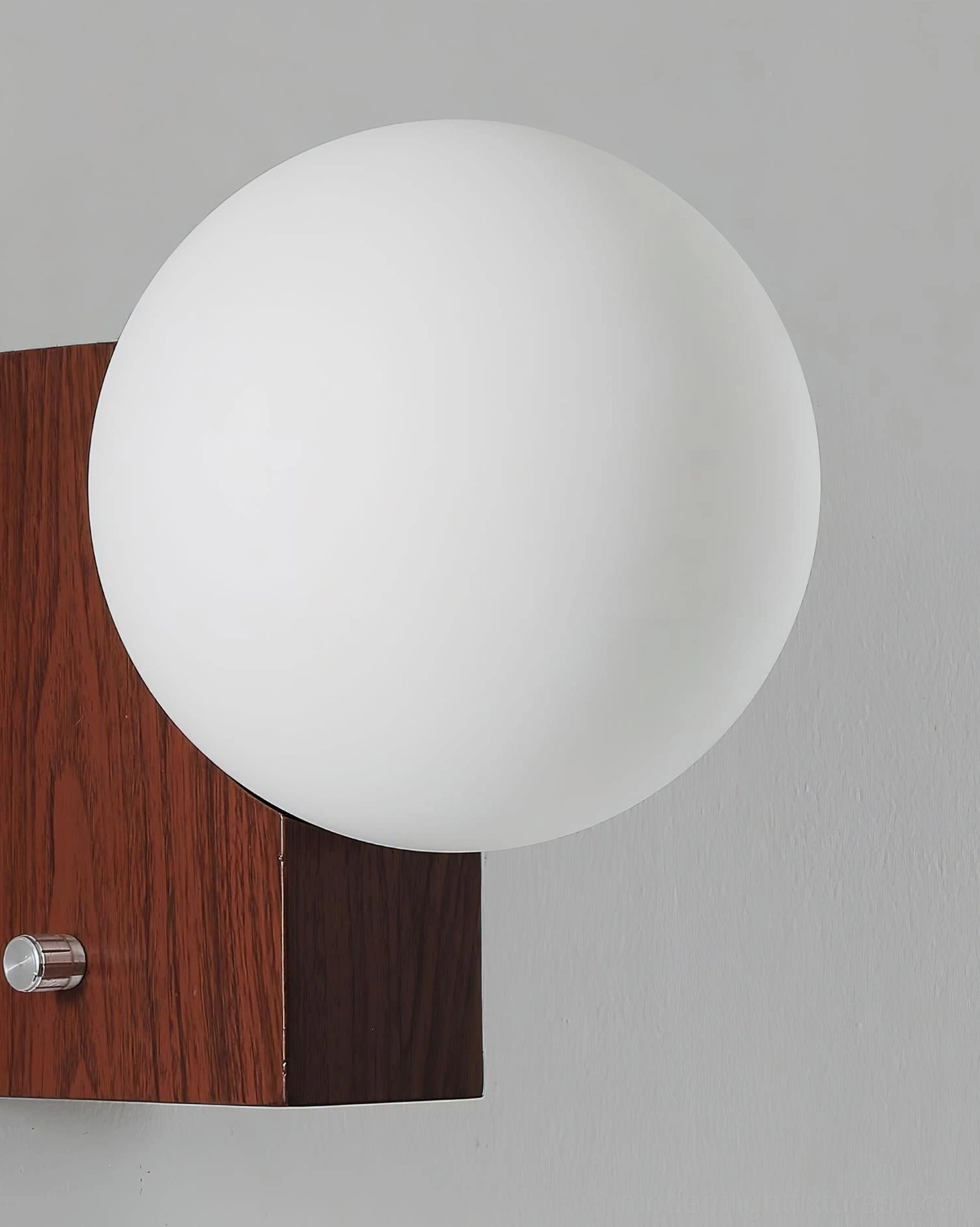 Glowen globe wall lamp bedroom installation showing cozy ambiance and layered lighting design with nightstand