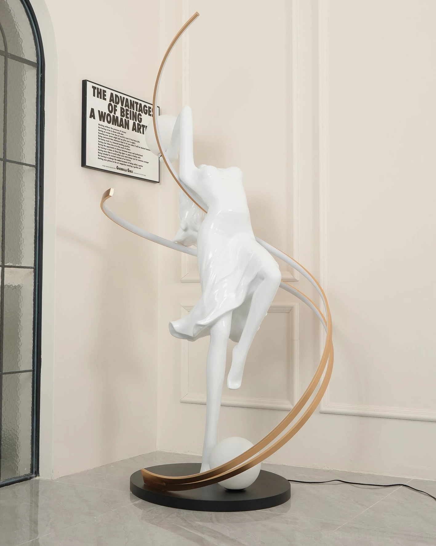 Goddess floor lamp back view showing sculptural form and metal accent placement design