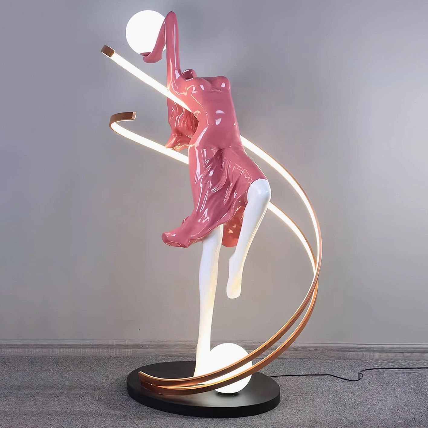 Goddess floor lamp frosted glass sphere light diffusion demonstrating warm ethereal glow quality
