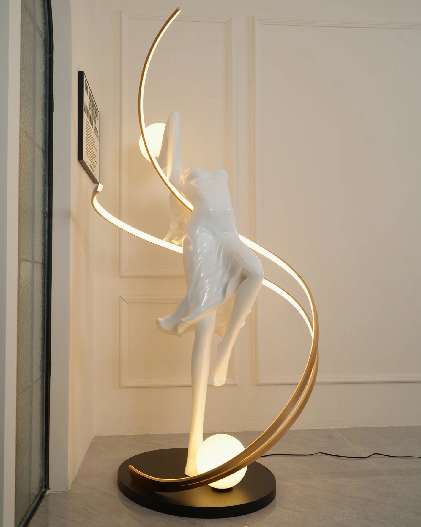 Full view goddess floor lamp showing proportions in modern interior with neutral palette and architectural elements