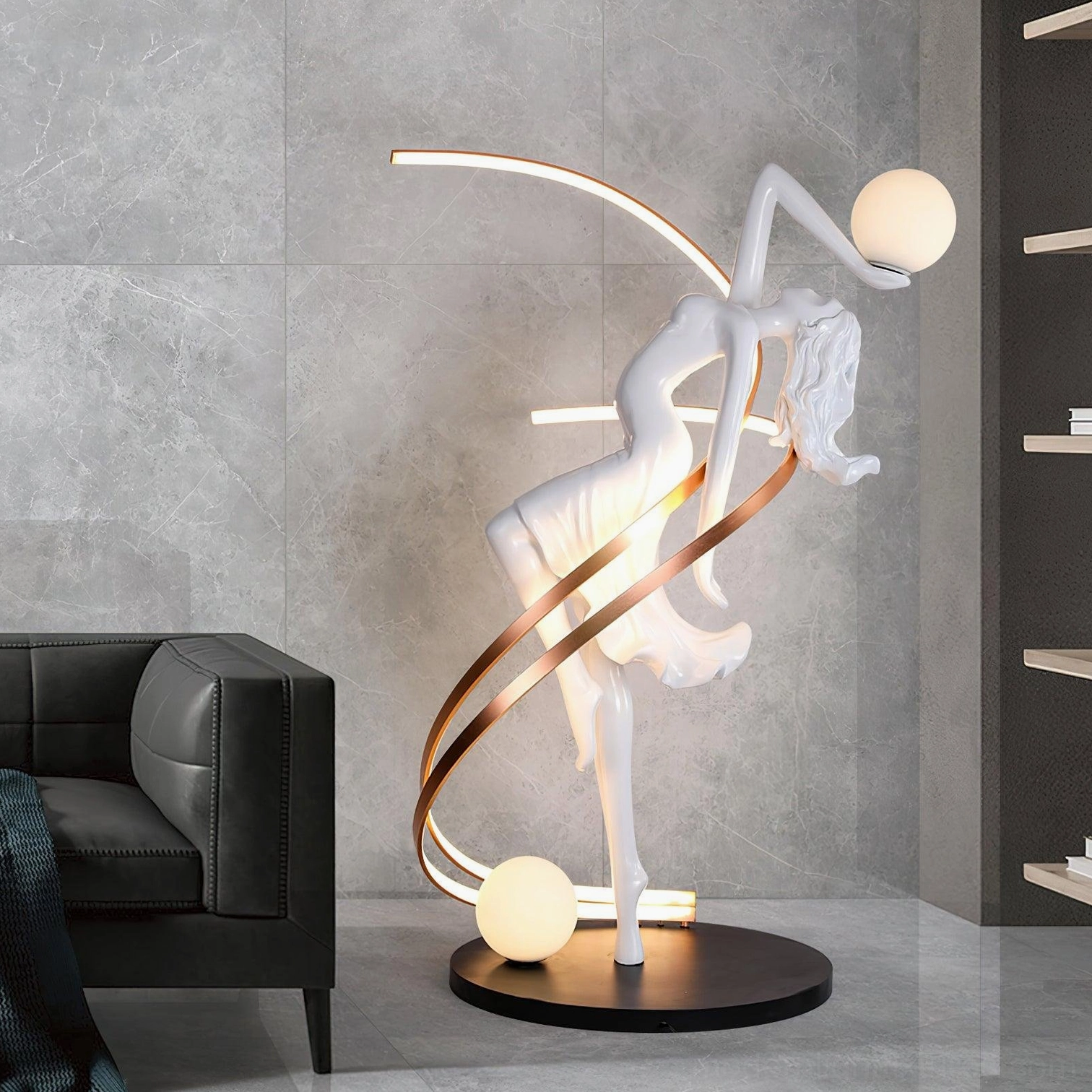Goddess sculpture floor lamp in contemporary living room with grey tile walls and black leather sofa, warm ambient lighting