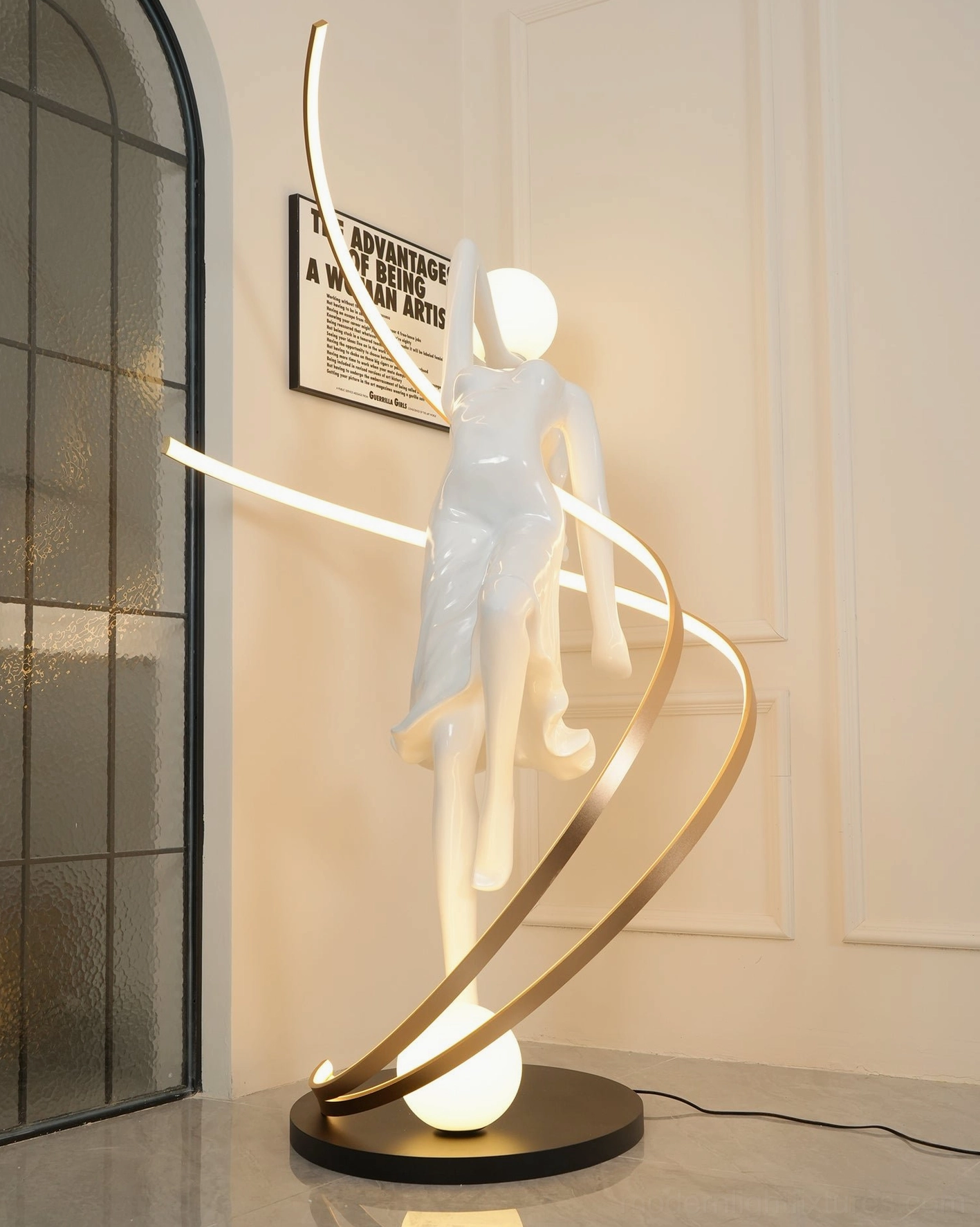 Detailed close-up view of goddess statue floor lamp resin sculpture with facial features and flowing fabric details