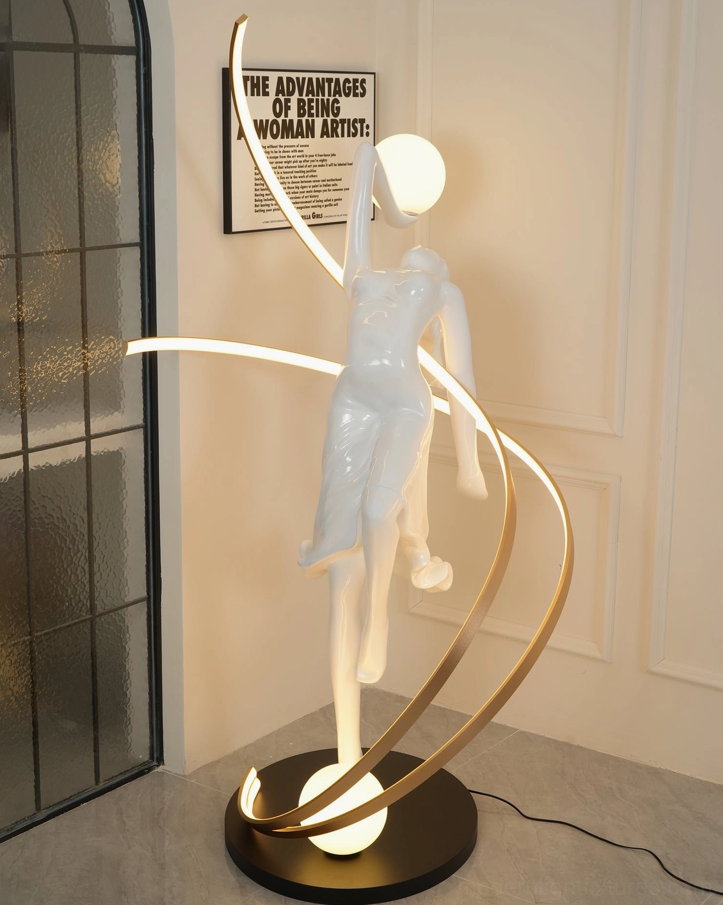Goddess floor lamp side profile showing graceful pose and dual frosted glass orb illumination spheres
