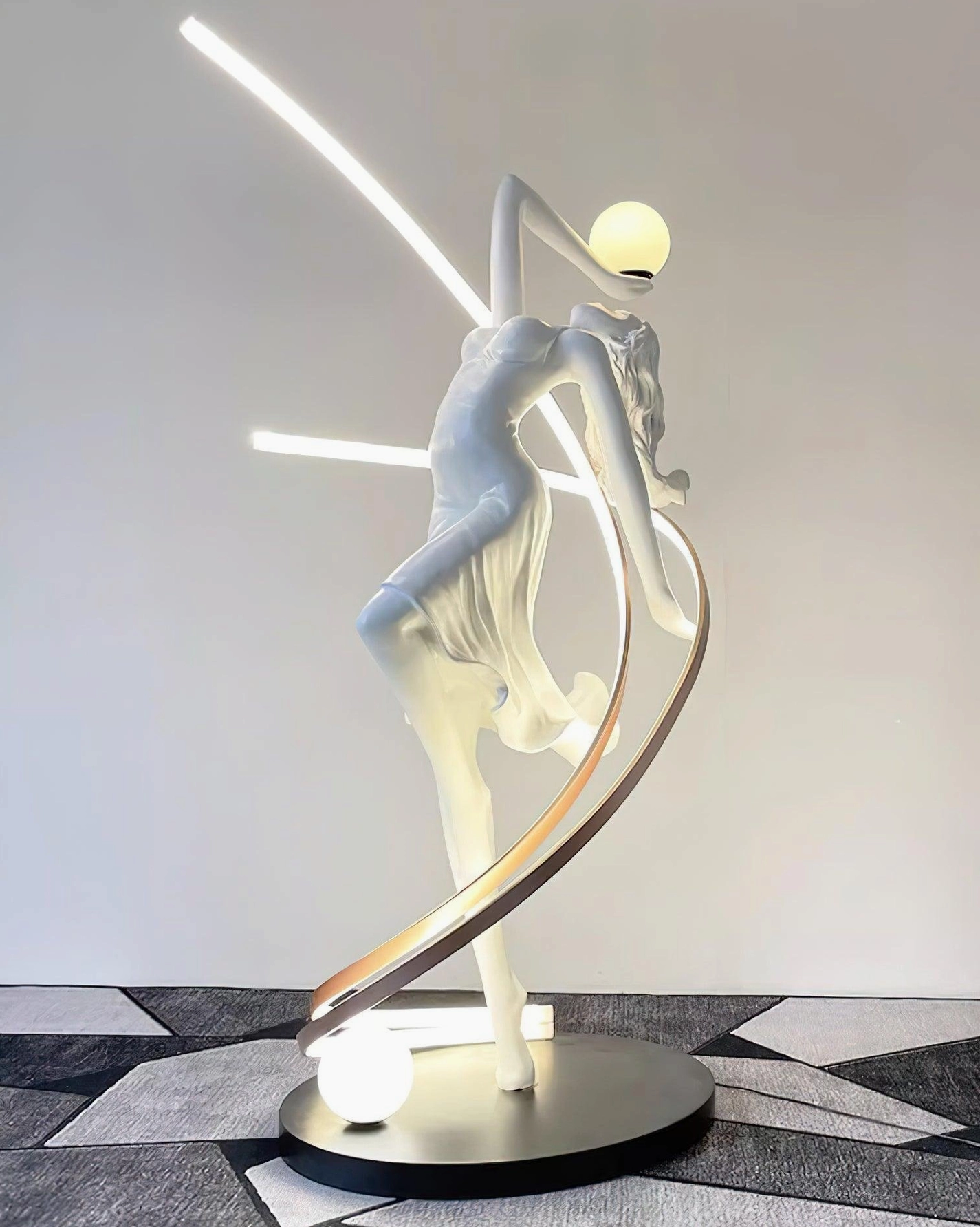 Goddess floor lamp upper sculptural form showing detailed resin craftsmanship and metal band accents