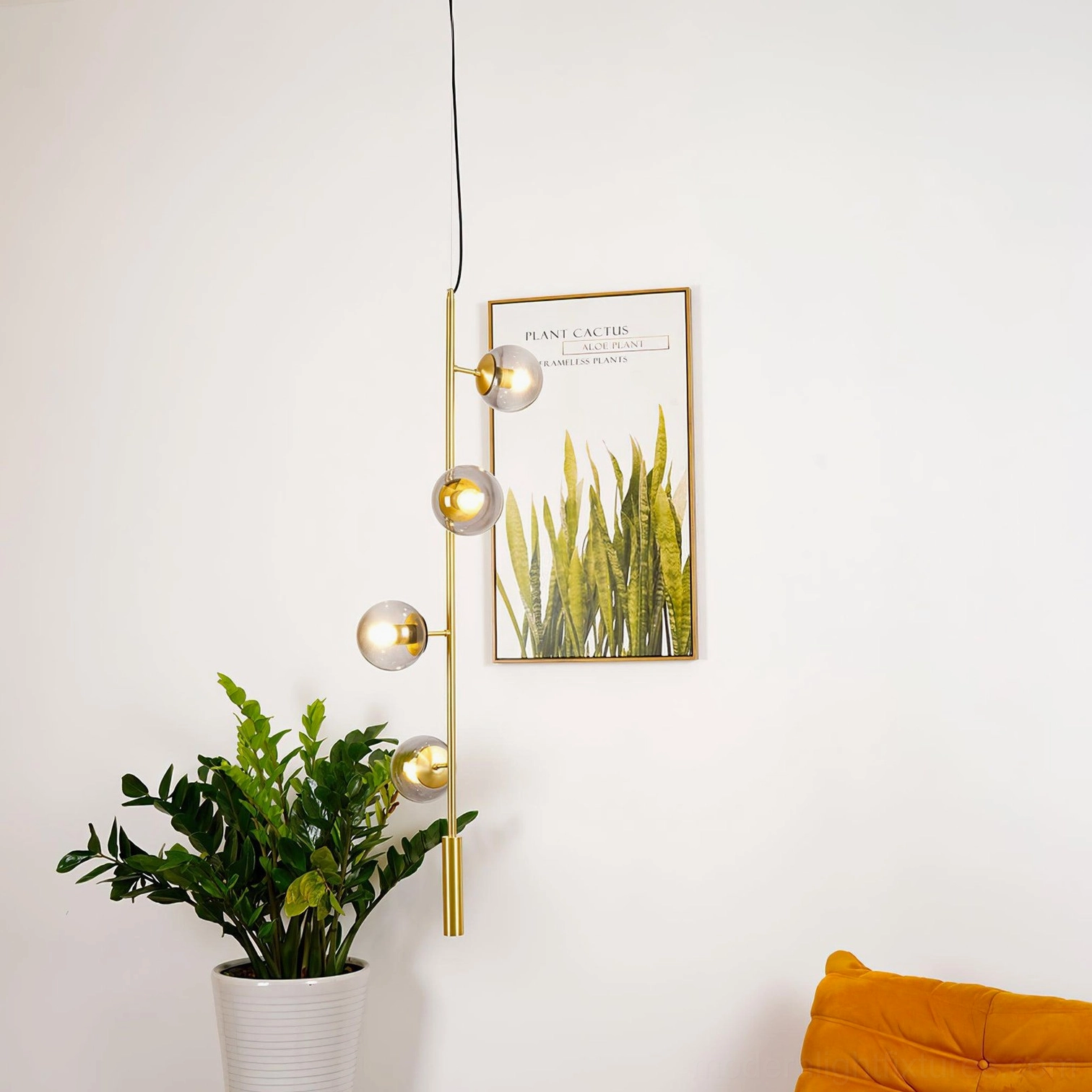 Gold polished brass orb chandelier with premium glass spheres, luxury finish showcase