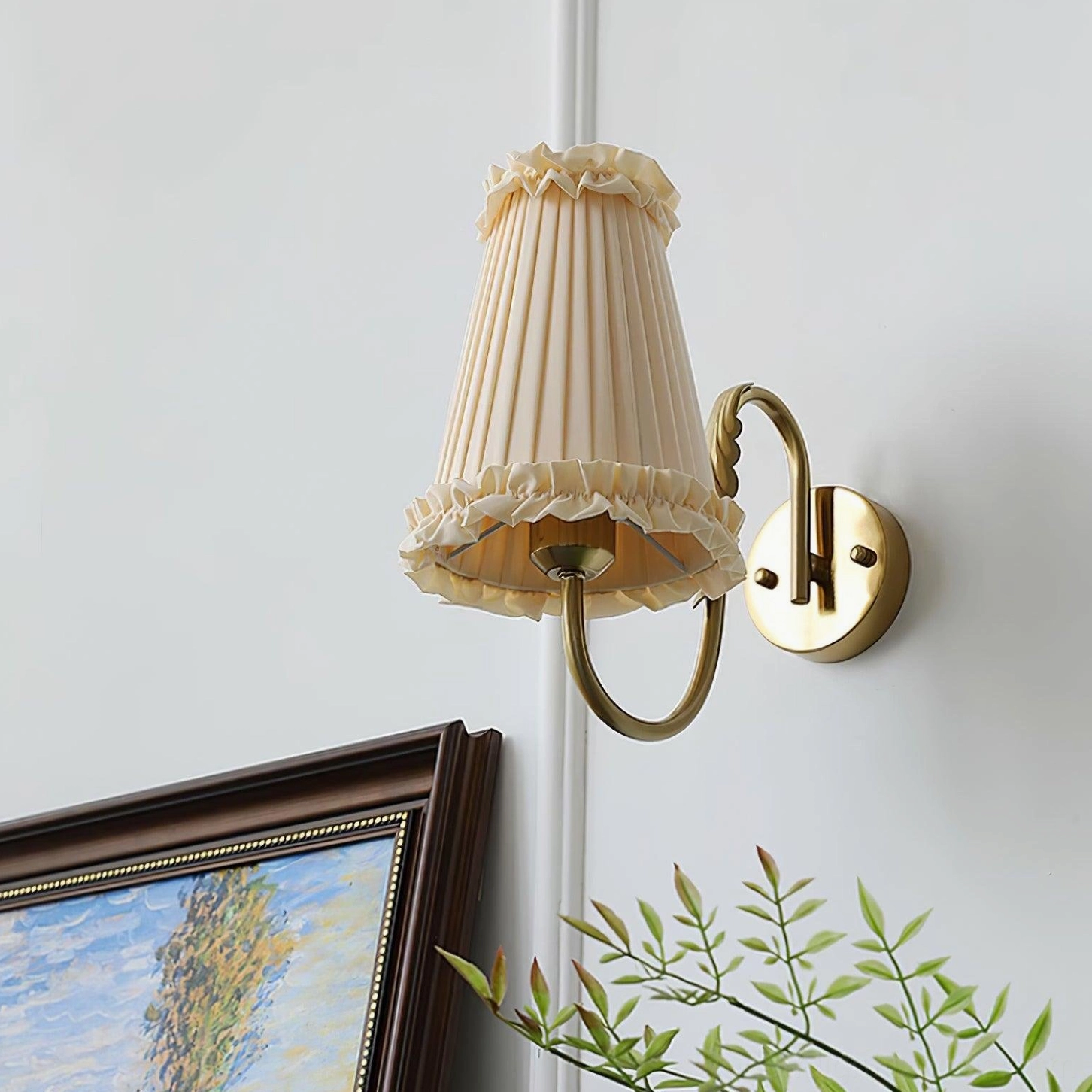 Gold brass pleated wall sconce fixture detail close-up product photography