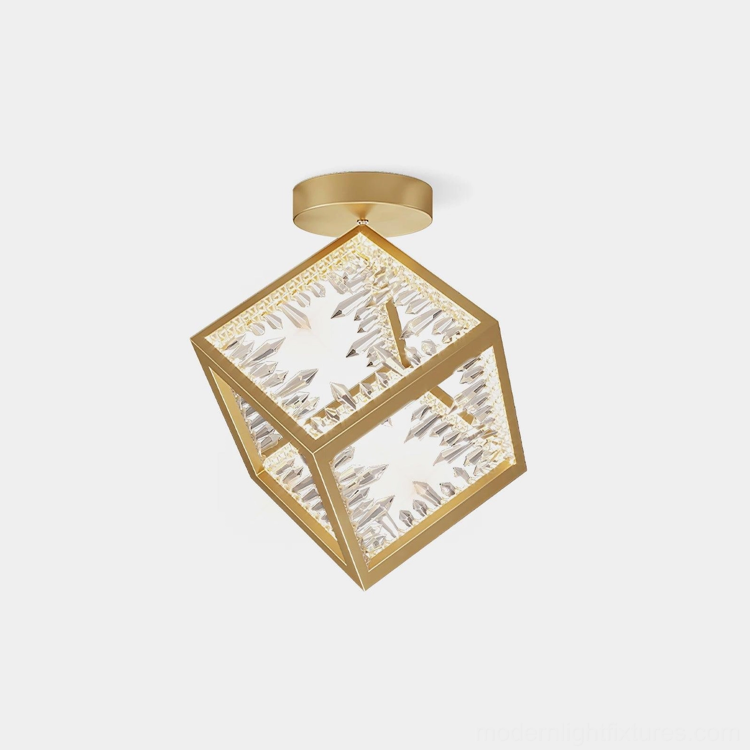 Gold cubic ceiling light with carved crystal glass panels, front overhead studio view
