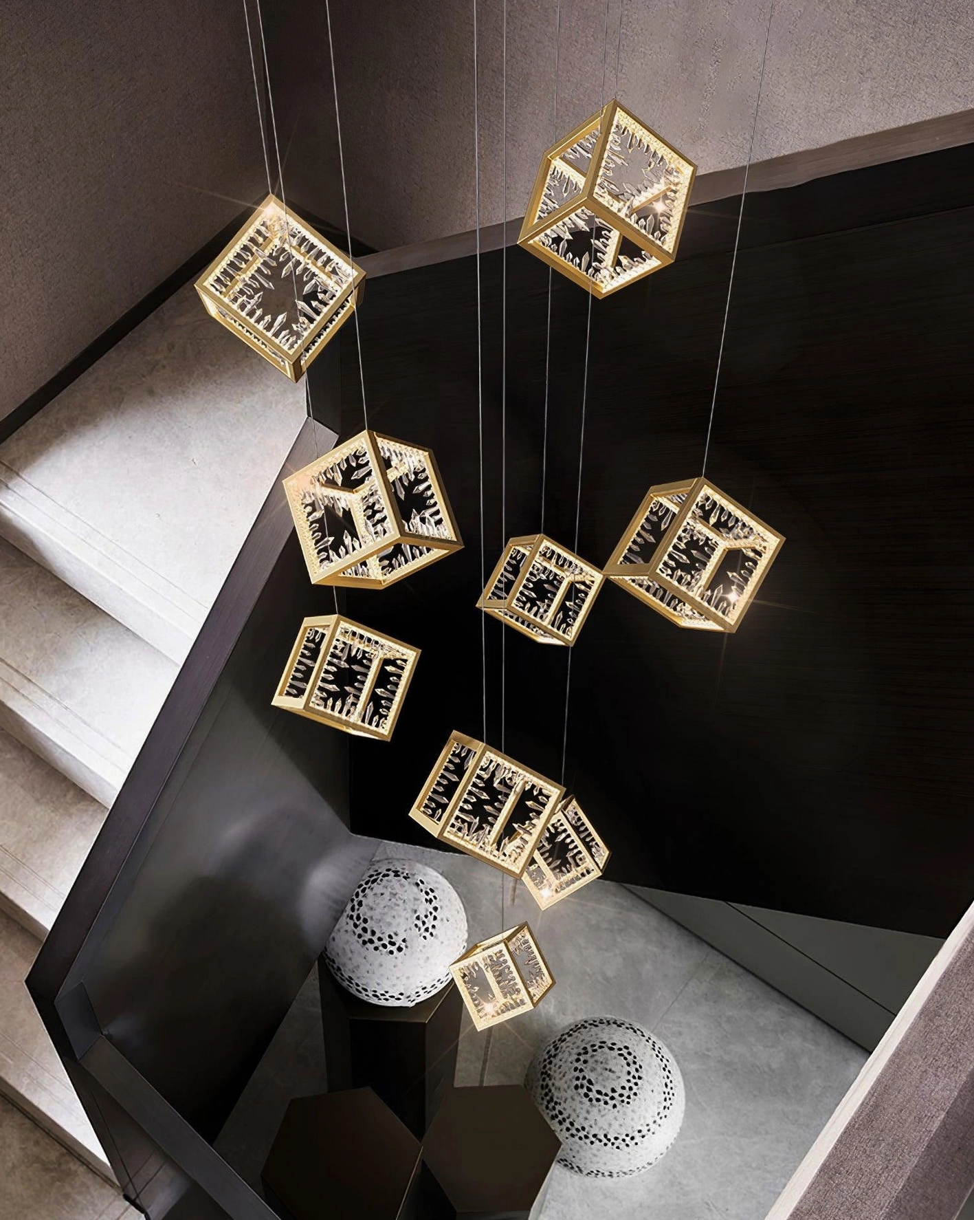 Modern gold cubic pendant chandelier front-facing view displaying pristine craftsmanship