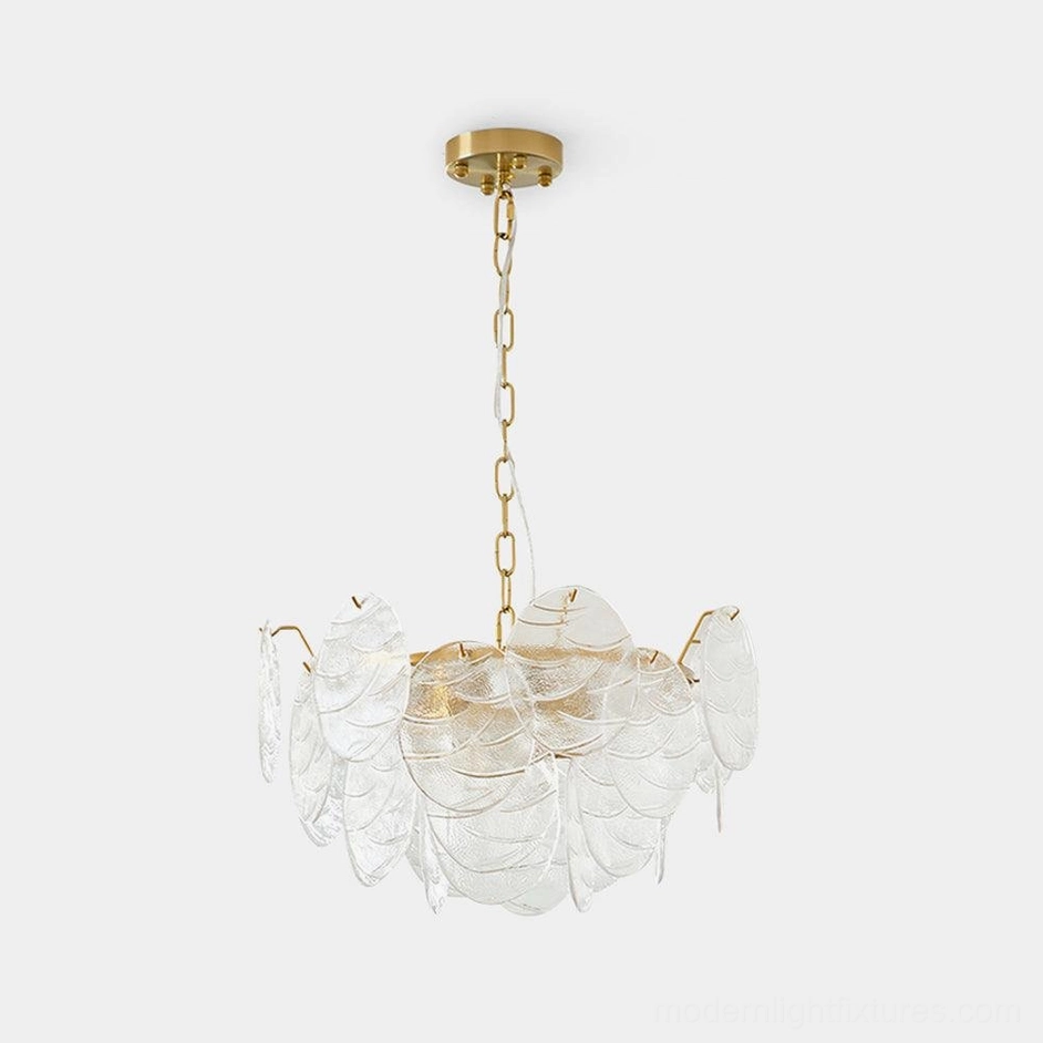 Gold disc Victorian glass chandelier with layered clear glass panels front view studio photography