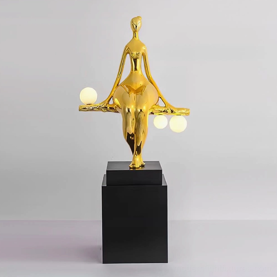Gold polished human sculpture floor lamp with elegant proportions, luxury modern interior lighting