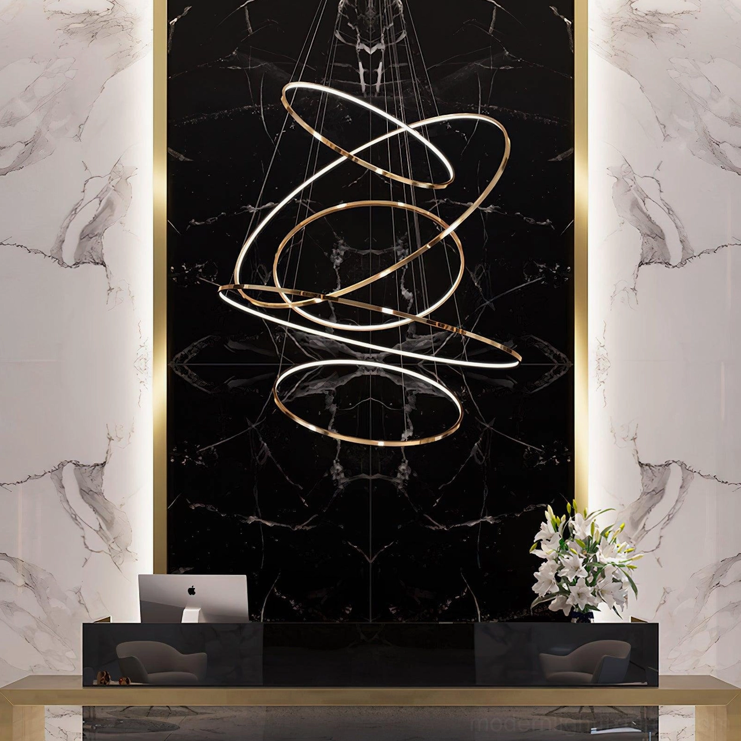 Elegant gold ring LED chandelier in luxury marble foyer with warm lighting ambiance
