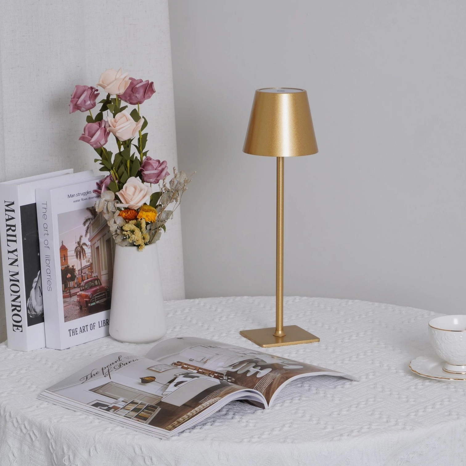 Gold metallic modern minimalist table lamp with tapered shade luxury dining table setup