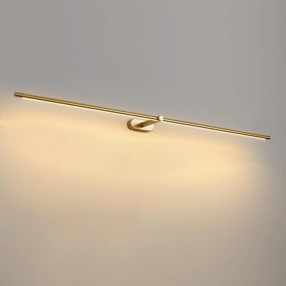 Gold finish linear wall sconce bedroom lighting creating warm ambient glow headboard installation