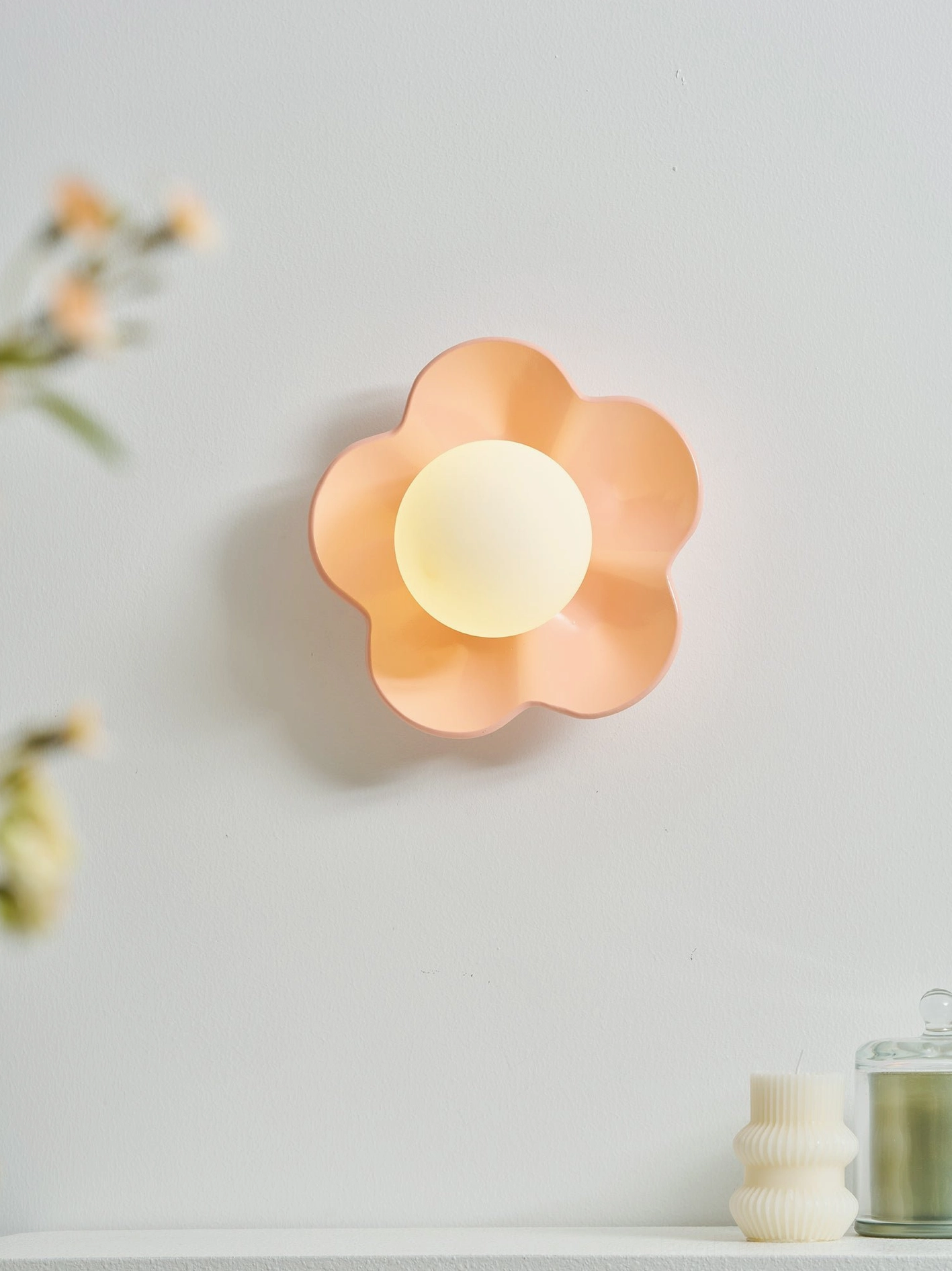 Golden yellow Fleur wall sconce entry hallway installation - welcoming modern flower lamp sets mood upon arrival
