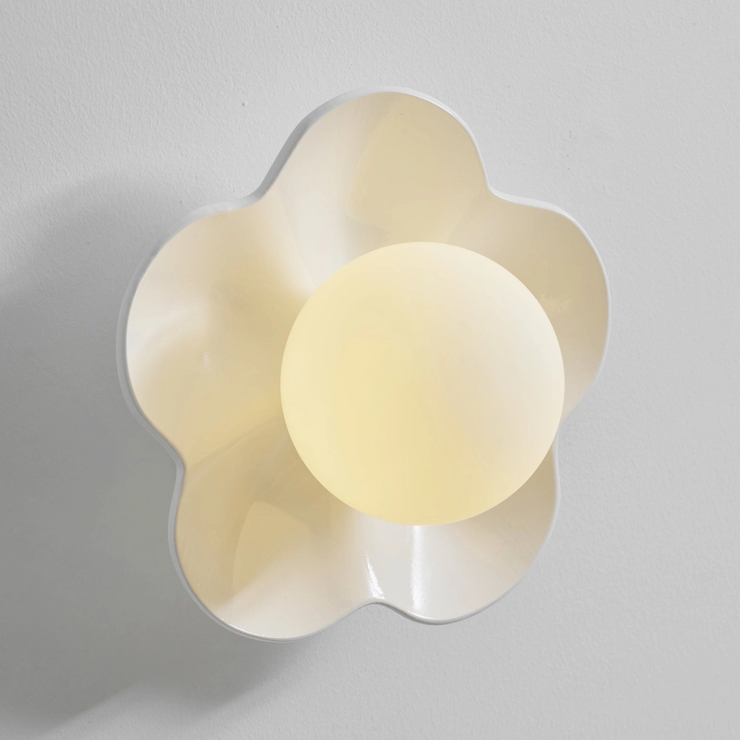 Golden yellow Fleur wall sconce sunlight color captured resin - warm botanical lamp optimistic radiance