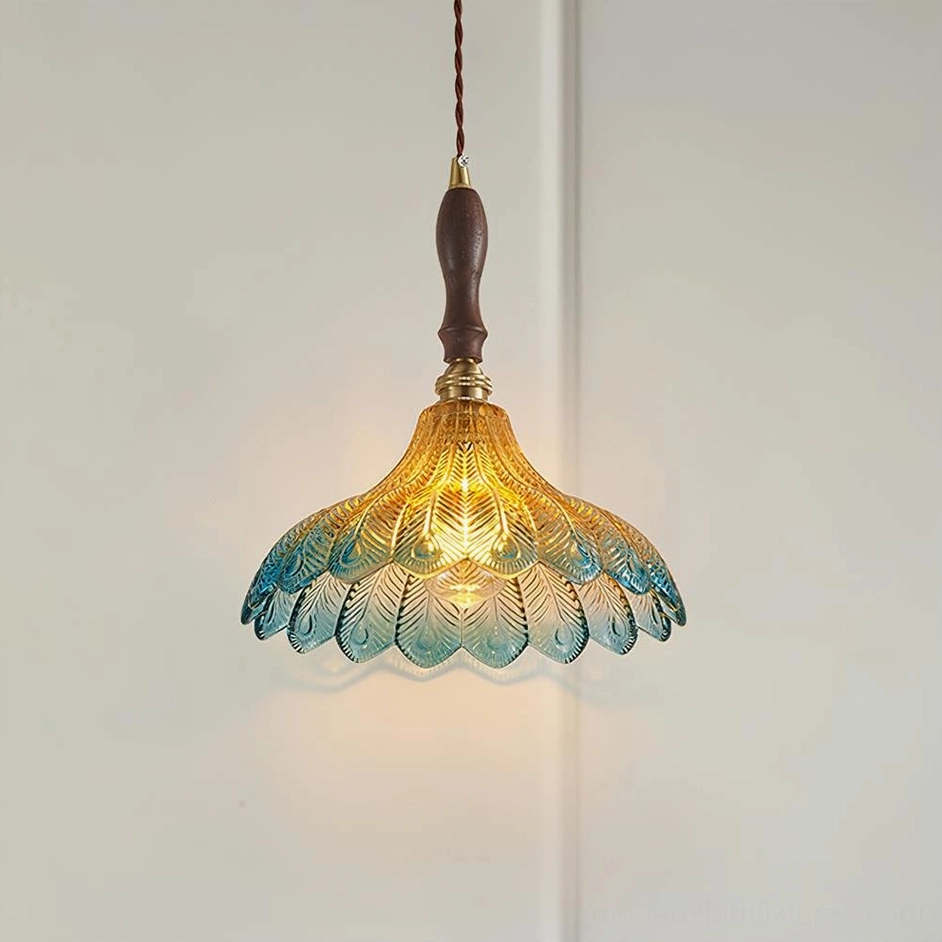 Gradient peacock blue glass pendant light with yellow to blue color transition and scalloped feather edge detail