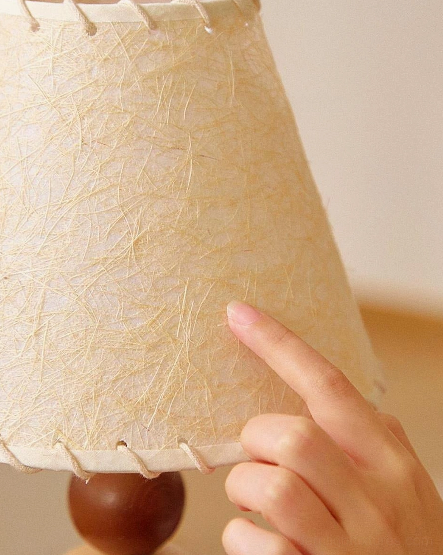 Grainelle wooden table lamp base showing natural wood grain variation and alternating tone pattern in white-ash discs
