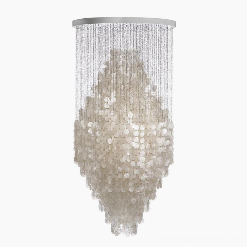 Grand shell chandelier statement piece in luxury setting with oversized white capiz shell cluster arrangement