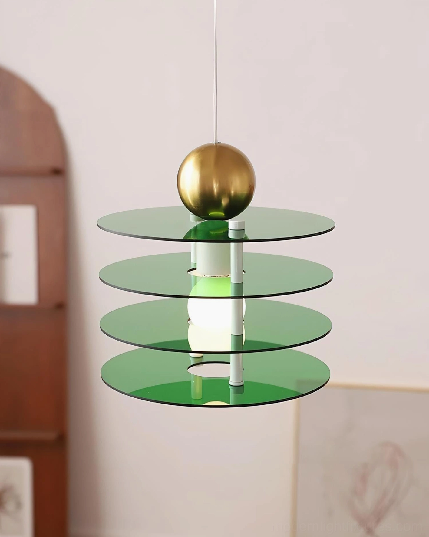 Green transparent acrylic tiered pendant light with gold sphere top