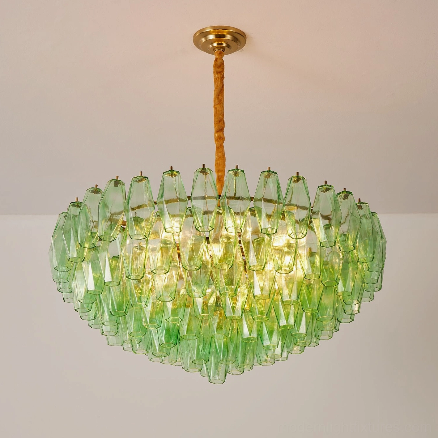 Green and amber tiered glass chandeliers color comparison showing jewel-toned and warm tone options