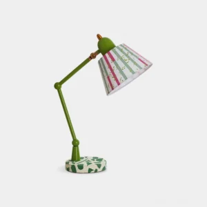 Green swing arm table lamp with artistic striped shade and leaf motif base, front three-quarter view on white background