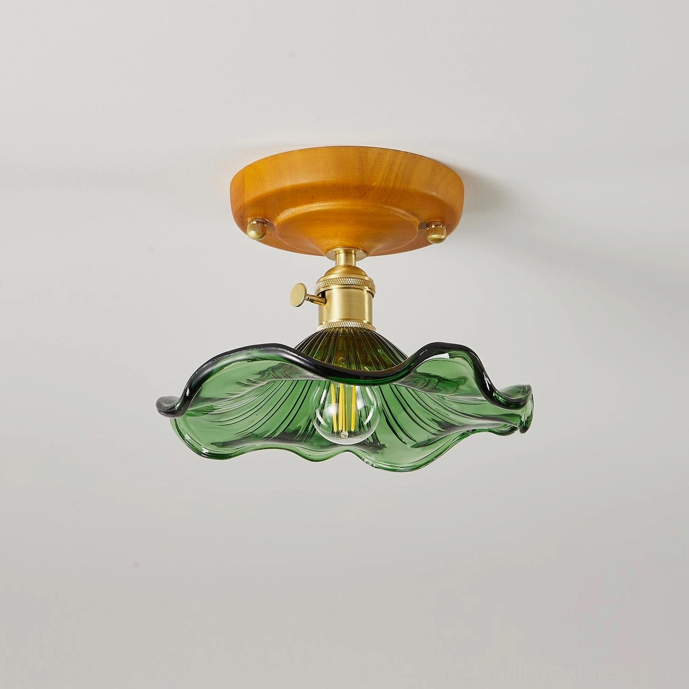 Green wavy glass shade ceiling fixture, side angled view showing texture and wood canopy detail