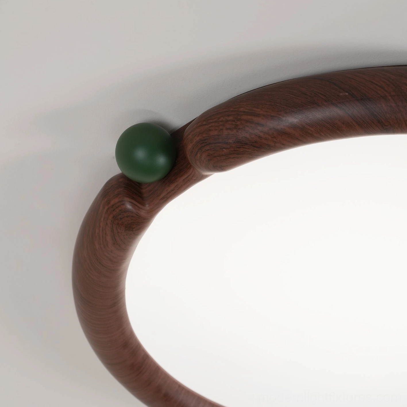 Modern round ceiling light fixture with green finish option for eclectic interior design
