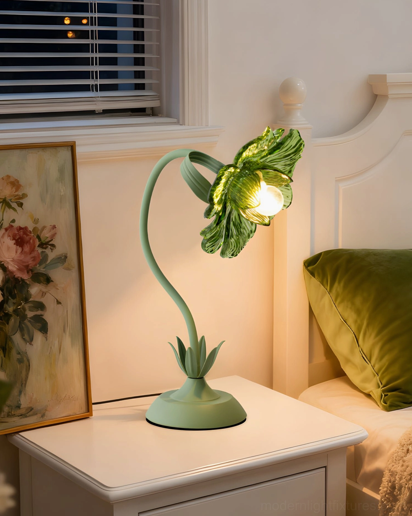 Selmira modern lamp beside white wooden nightstand with green throw pillows and floral wall art