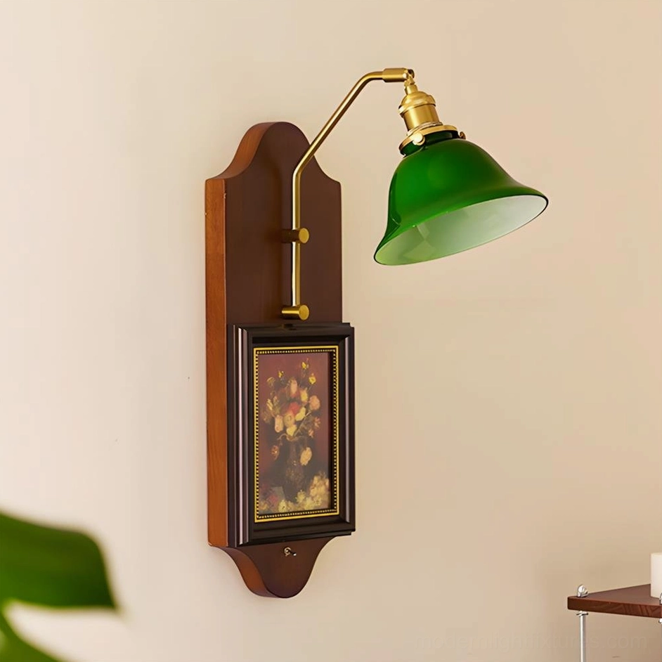 Minimalist unlit green glass wall sconce showing brass metal arm and walnut wood backplate details