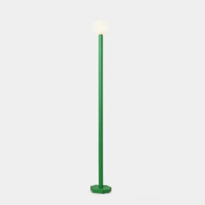 Modern green globe floor lamp with matte metal pole and octagonal base on white background - contemporary minimalist lighting design