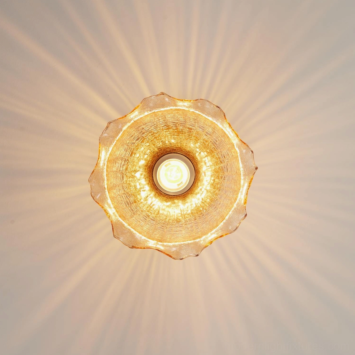 Green hand-blown glass ceiling light fixture modern installation perspective room setting