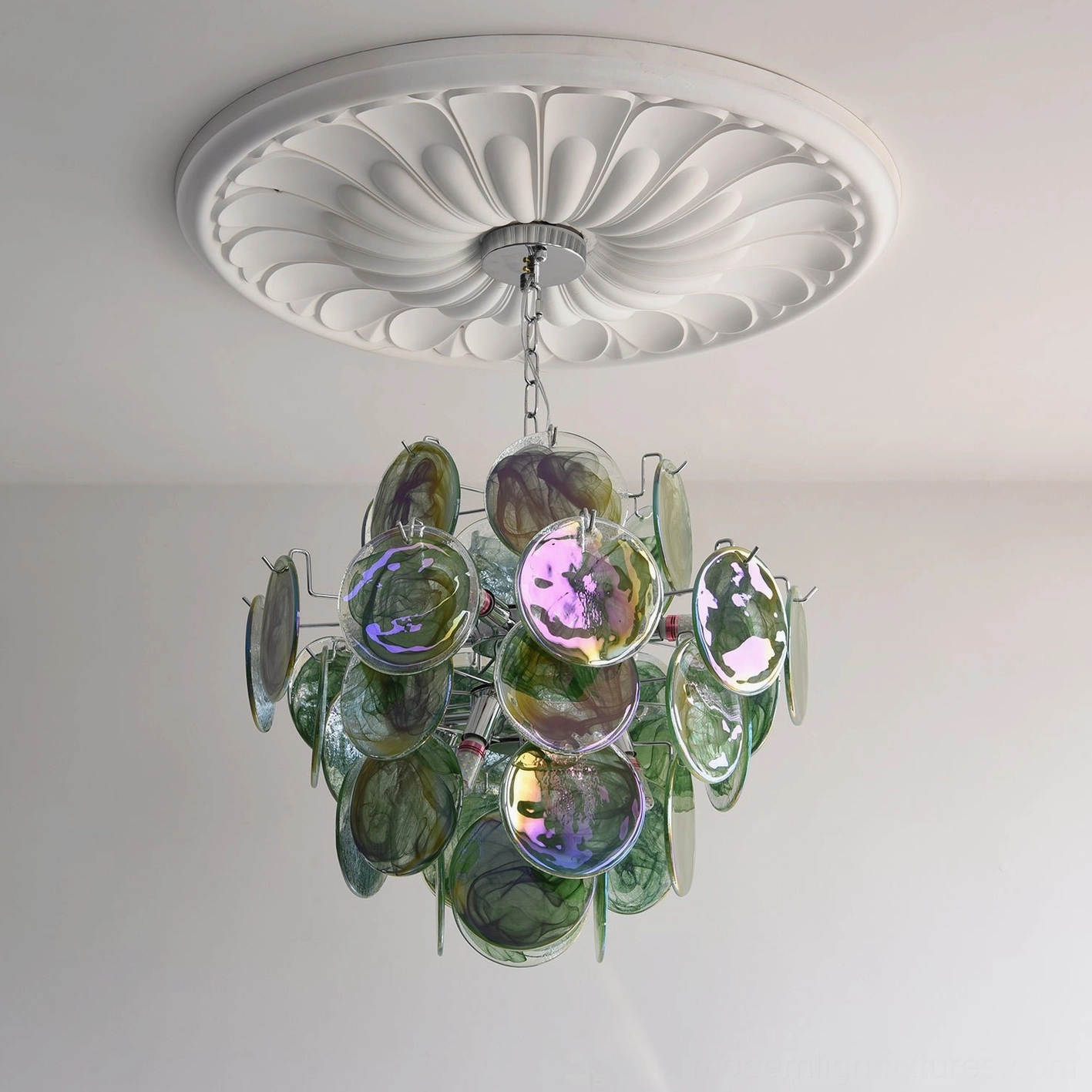 Green variant iridescent glass disc chandelier showing organic form and light diffusion