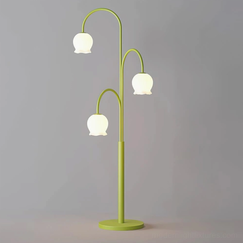 Contemporary green lily floor lamp eye-level frontal view with curved arms and frosted bell shades