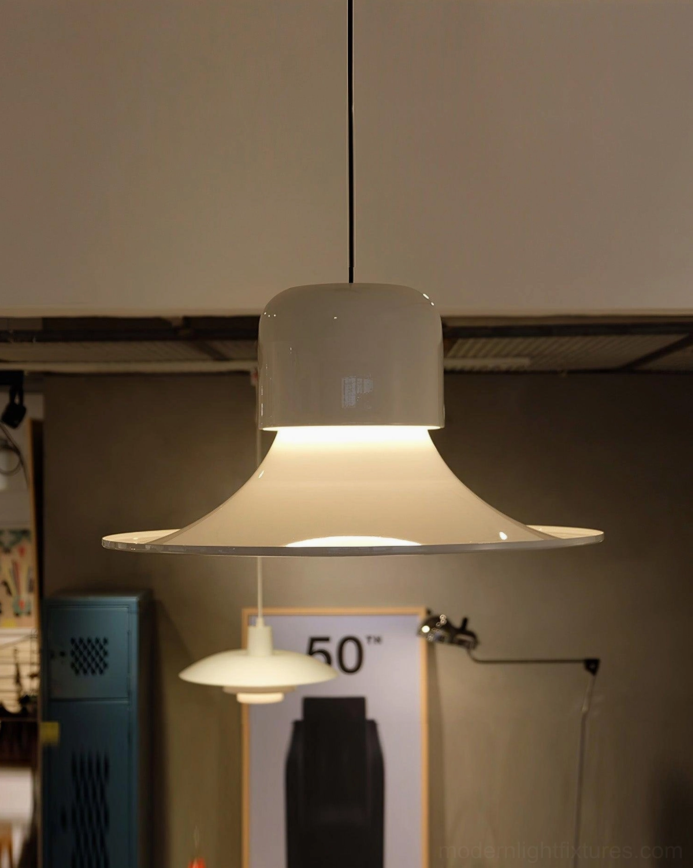 Green modern pendant light with carbon steel shade and integrated LED technology