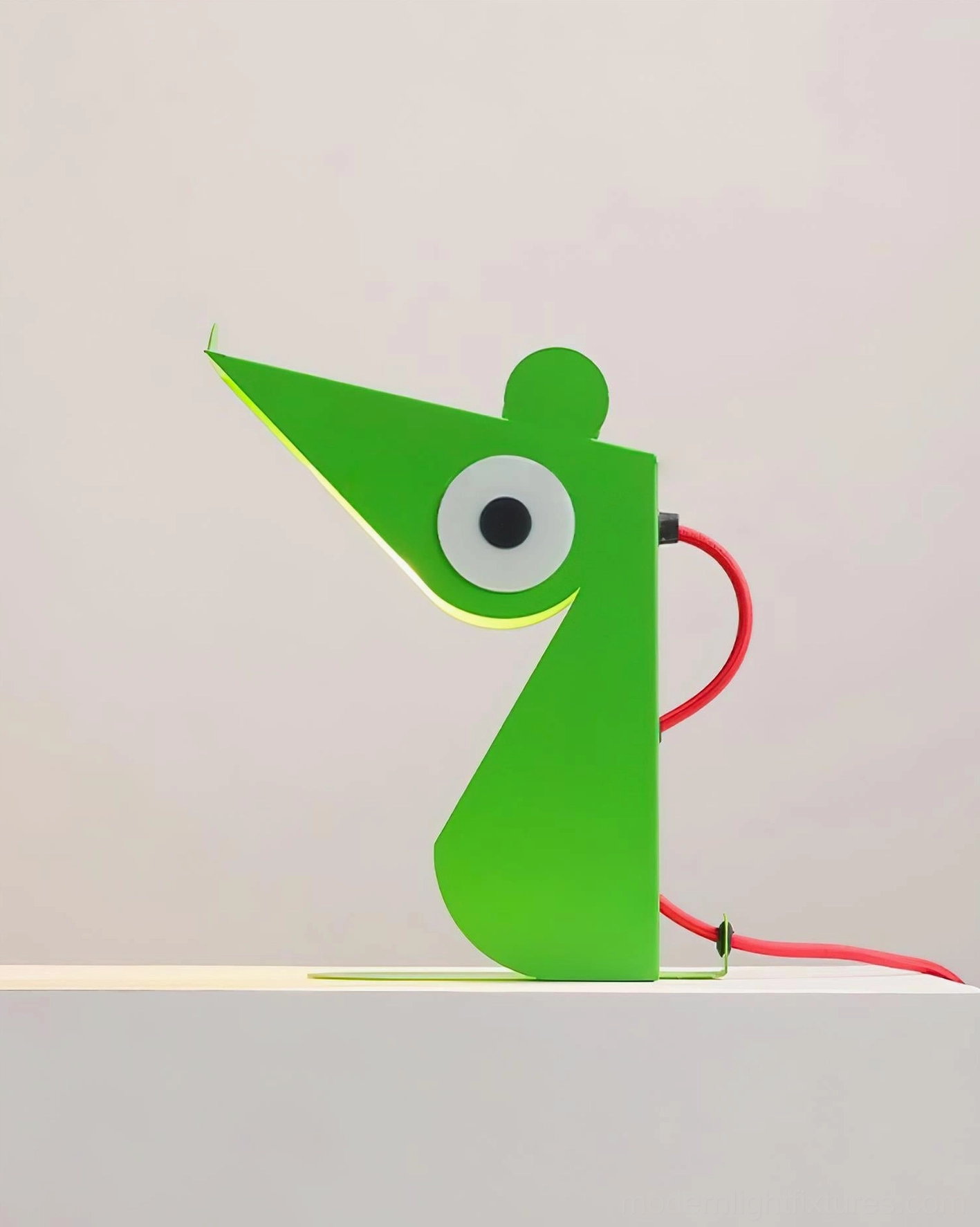 Green mouse playful table lamp alternative angle showing geometric form and balanced proportions
