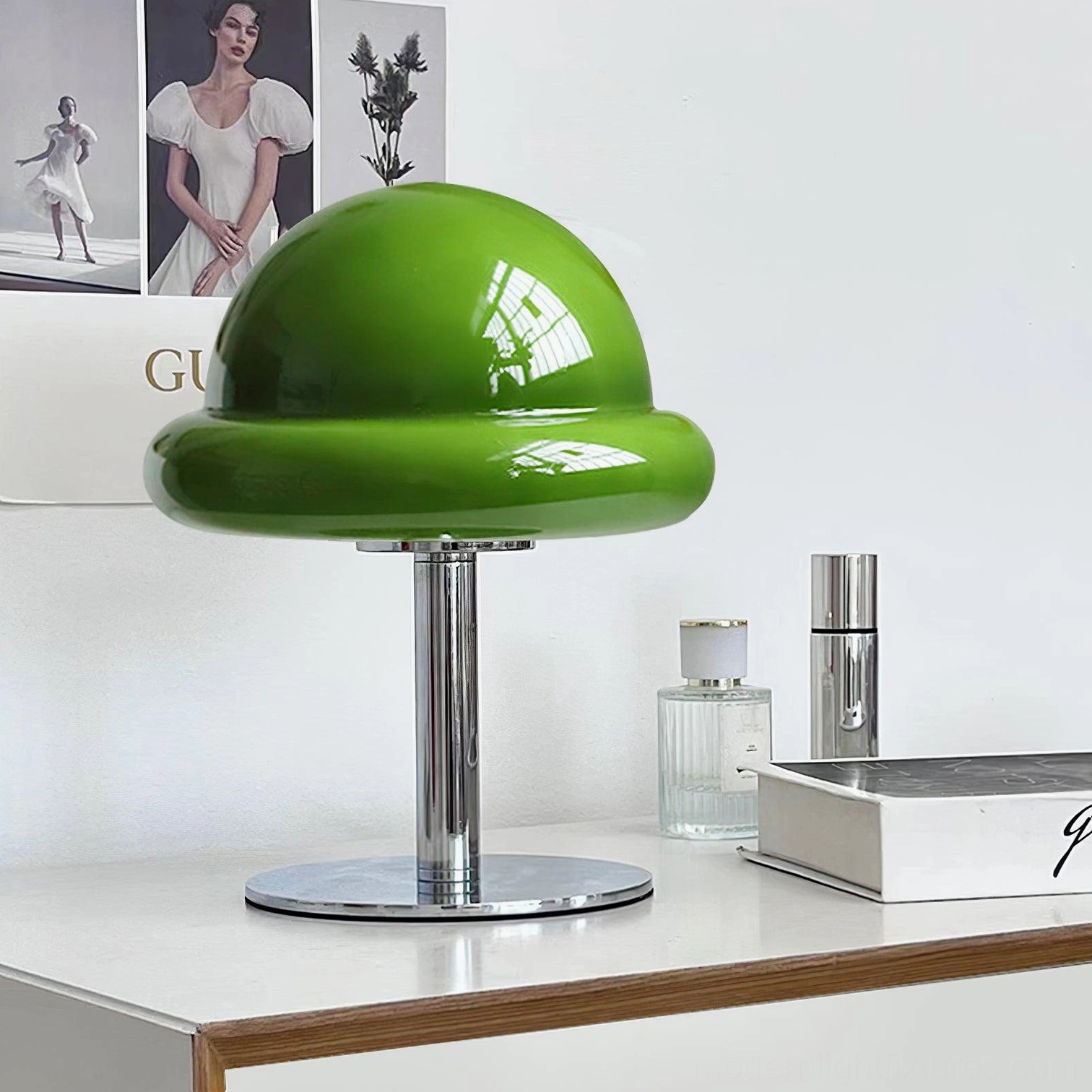 Emerald green glossy glass mushroom lamp on modern vanity dresser with polished chrome hardware