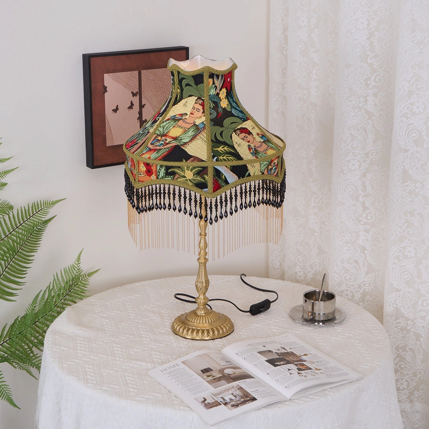 Green peony silk table lamp with decorative brass base in modern eclectic living space