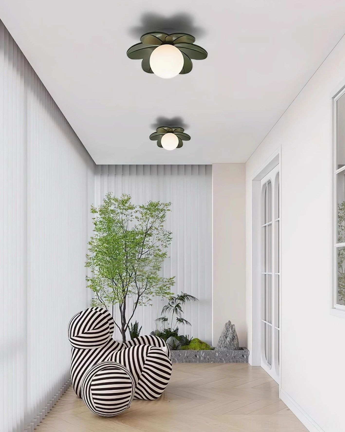 Dark green floral ceiling lights in modern residential hallway with two fixtures and striped lounge seating