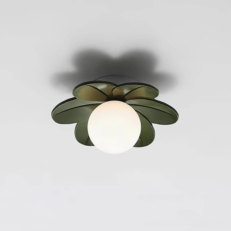 Green resin petal flower ceiling light showing botanical-inspired form in contemporary living room